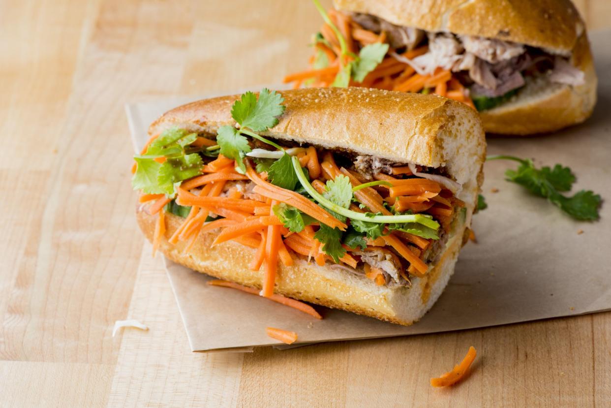 Banh mi sandwich. Classic Japanese Vietnamese or Thai cuisine favorite. Variety of sandwiches made w/ beef broths, rice noodles, pork, chicken, tofu, scallions, mushrooms, cilantro, peanuts, bean sprouts, eggs, peanut & chili pepper sauce.