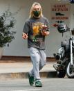 <p>Pete Wentz shows off his long blond locks during a coffee run in Los Angeles on Sept. 24. </p>