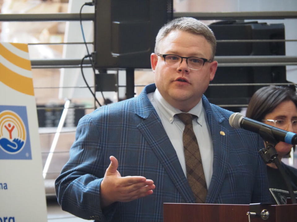  Samuel Snideman, United Way of Central Indiana’s vice president of government relations, speaks during a medical debt relief event on Monday, June 17, 2024. (Leslie Bonilla Muñiz/Indiana Capital Chronicle)