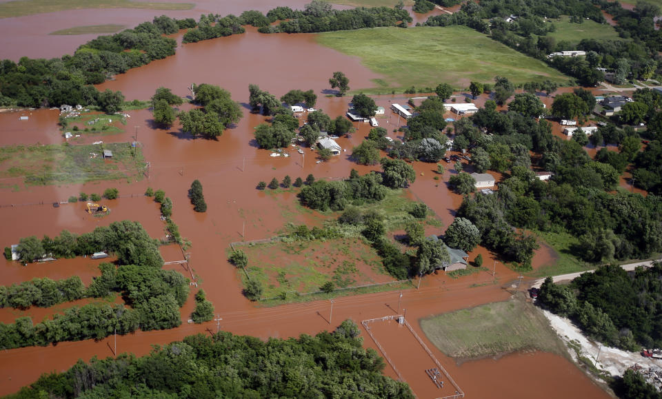 Flooding in Kingfisher, Okla. is pictured from the air, Tuesday, May 21, 2019. Flooding following heavy rains was an issue across the state. (AP Photo/Sue Ogrocki)