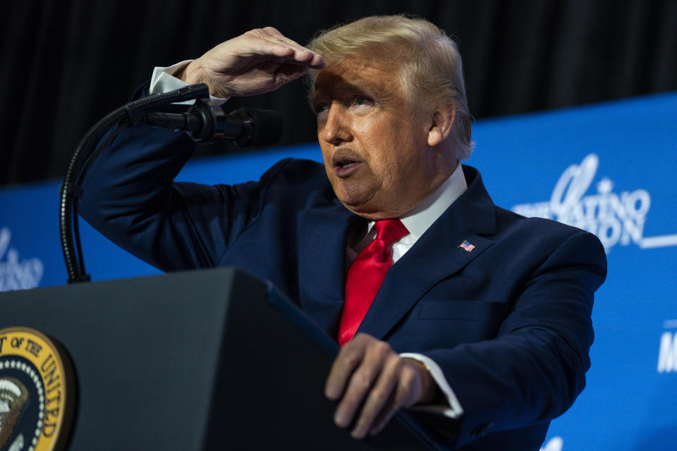 President Donald Trump speaks to the Latino Coalition Legislative Summit, Wednesday, March 4, 2020, in Washington. (AP Photo/Evan Vucci)