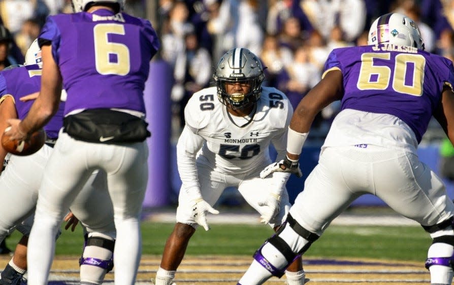 Monmouth middle linebacker Da'Quan Grimes (50), who will wear No. 5 this spring, looks over the James Madison offense during an FCS Playoff game in Harrisonburg, Virginia on Dec. 7, 2019.