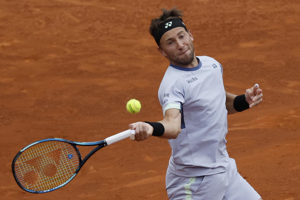 Casper Ruud of Norway returns the ball to Stefanos Tsitsipas of Greece during the final of the Barcelona Open tennis tournament in Barcelona, Spain, Sunday, April 21, 2024. (AP Photo/Joan Monfort)