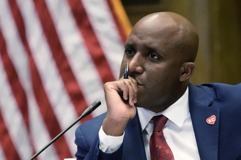 Mayor Quinton Lucas listens to public comments on a resolution that would make Kansas City, Mo, a sanctuary city for transgender people during a committee meeting to consider the resolution, Wednesday, May 10, 2023, in Kansas City, Mo. The move comes in the wake of Missouri legislators voting to ban gender-affirming care and trans athletes. (AP Photo/Charlie Riedel)