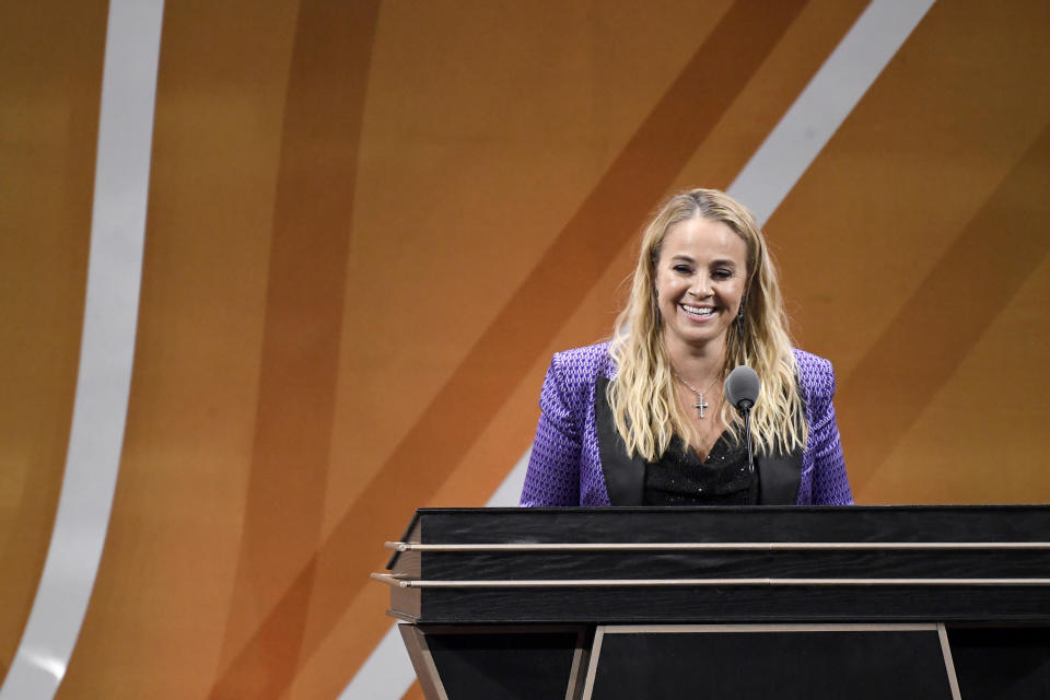 Becky Hammon speaks during her enshrinement at the Basketball Hall of Fame, Saturday, Aug. 12, 2023, in Springfield, Mass. (AP Photo/Jessica Hill)