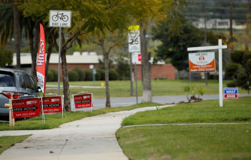 FILE PHOTO: Signs advertising an open house in Pasadena are pictured during the coronavirus outbreak