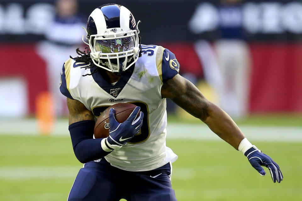 Los Angeles Rams running back Todd Gurley (30) runs against the Arizona Cardinals during the first half of an NFL football game, Sunday, Dec. 1, 2019, in Glendale, Ariz. (AP Photo/Ross D. Franklin)