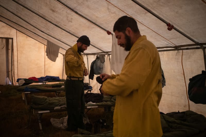 The Wider Image: Oregon inmates find redemption in fighting wildfires