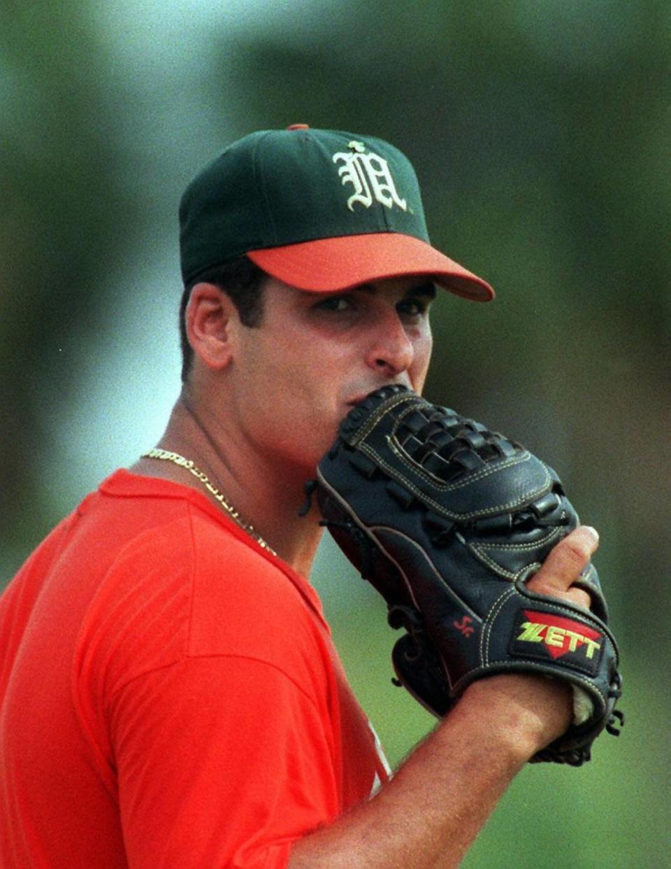 J.D. Arteaga takes a stare from the mound during practice at Mark Light as they prepare for the College World Series in Omaha. Photo by C.W. GRIFFIN-HERALD STAFF-5/28/97