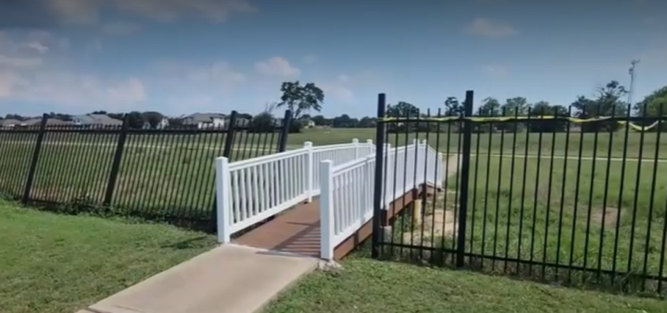 The baby was found on this small bridge on a walking trail in Katy (KPRC)