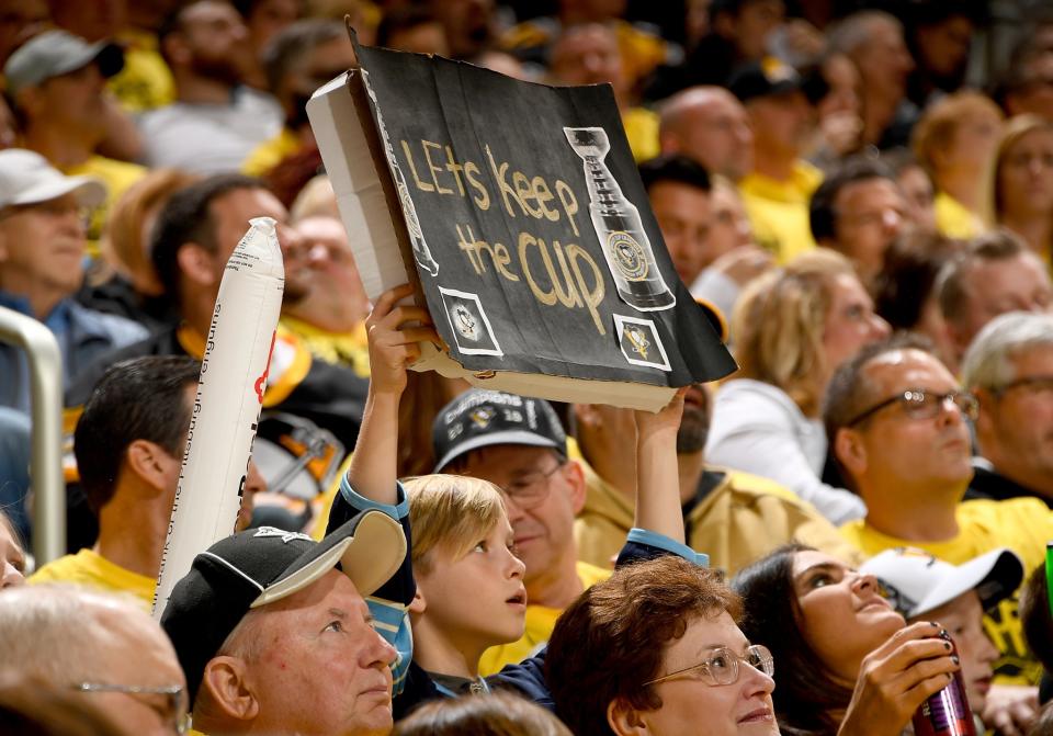 <p>A young Penguins fan hold up a sign against the Columbus Blue Jackets in Game Two of the Eastern Conference First Round during the 2017 NHL Stanley Cup Playoffs at PPG Paints Arena on April 14, 2017 in Pittsburgh, Pennsylvania. (Photo by Joe Sargent/NHLI via Getty Images) </p>