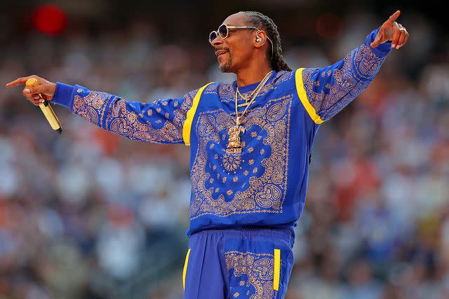 <p>Kevin C. Cox/Getty Images</p> Snoop Dogg performs during the Pepsi Super Bowl LVI Halftime Show at SoFi Stadium on February 13, 2022 in Inglewood, California