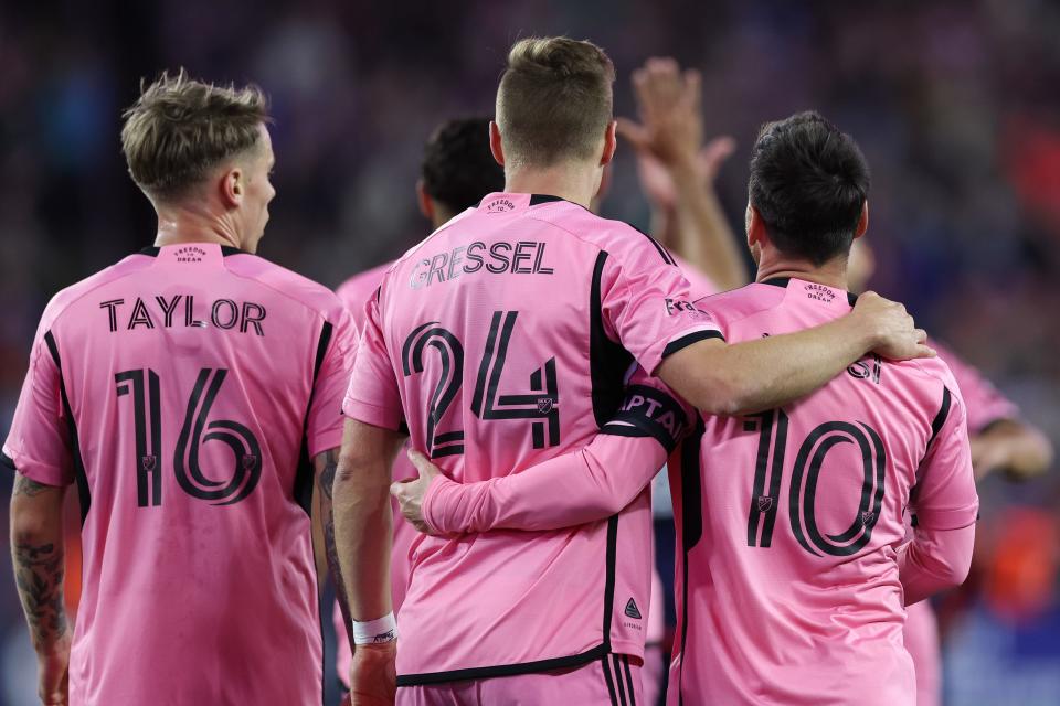 Inter Miami CF midfielder Lionel Messi (10) with midfielder Julian Gressel (24) and forward Robert Taylor after his goal in the second half against the New England Revolution at Gillette Stadium.