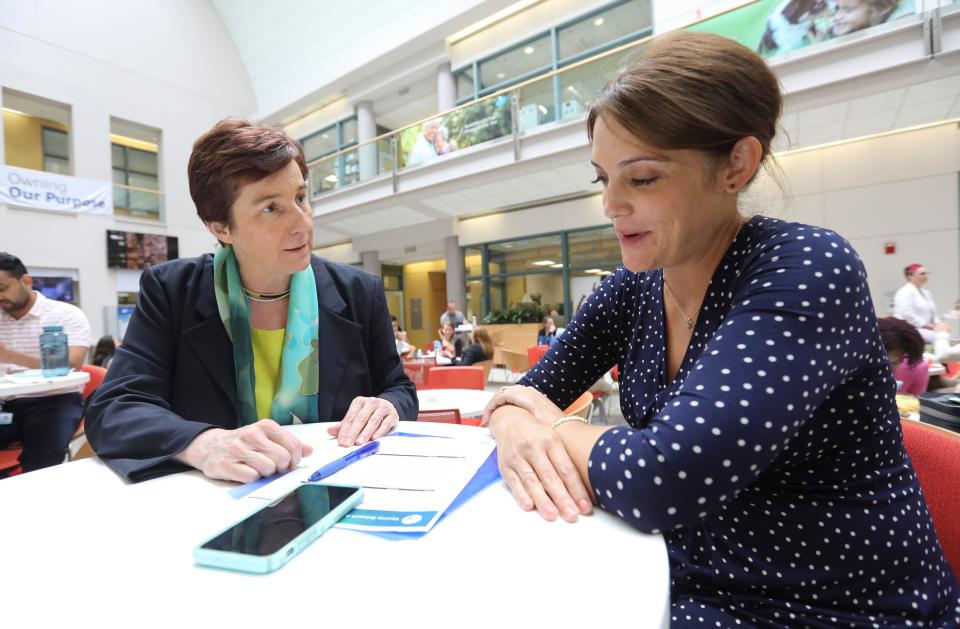 Kathrin Jansen, left, senior vice president and head of Vaccine Research and Development and a member of the Pfizer, Inc. worldwide research and development leadership team, photographed with her chief of staff, Markay Hopps at Pfizer's Pearl River site on Tuesday, August 27, 2019.