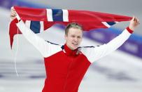 Speed Skating - Pyeongchang 2018 Winter Olympics - Men's 500m competition finals - Gangneung Oval - Gangneung, South Korea - February 19, 2018 - Havard Lorentzen of Norway celebrates after winning a gold medal. REUTERS/John Sibley