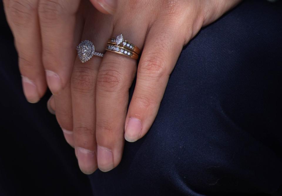 Veronica Gonzales wears a ring her stepmother gifted her, on the left, and her stepmother’s wedding ring, on the right, in her memory at San Joaquin Delta College in Stockton on Sept. 14, 2022. Gonzales’ stepmother died in a train accident on Sept. 5.