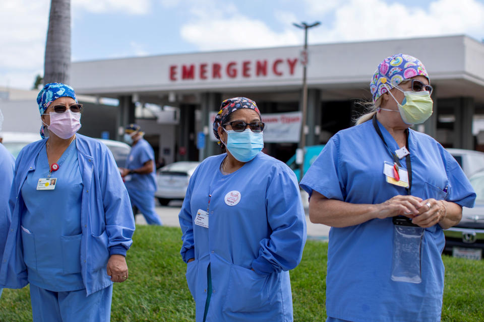 Healthcare workers at Fountain Valley Regional Hospital hold a rally outside their hospital for safer working conditions during the outbreak of the coronavirus disease (COVID-19) in Fountain Valley, California, U.S., August 6, 2020. REUTERS/Mike Blake     TPX IMAGES OF THE DAY