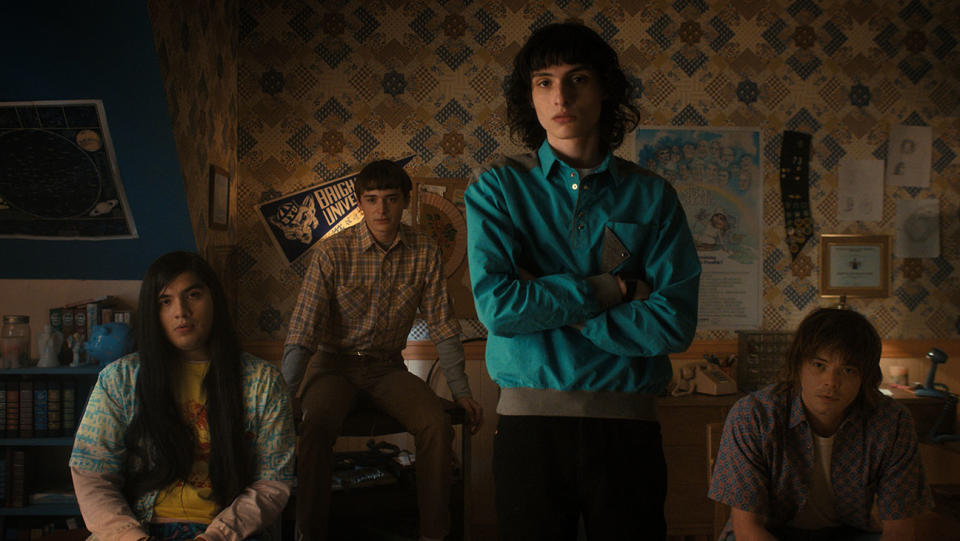 Eduardo Franco as Argyle, Noah Schnapp as Will Byers, Finn Wolfhard as Mike Wheeler, and Charlie Heaton as Jonathan in STRANGER THINGS.