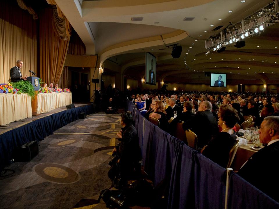 President Barack Obama, left, speaks during the White House Correspondents' Association Dinner at the Washington Hilton Hotel, Saturday, May 3, 2014, in Washington.