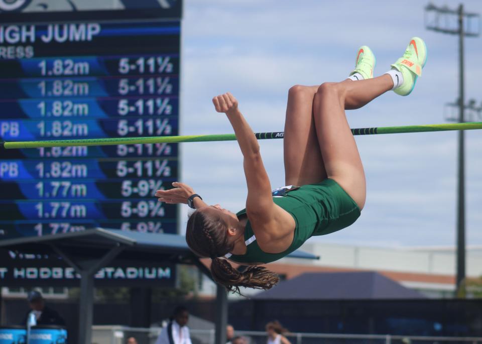 Kristi Snyman of Jacksonville University drops over the bar on her third and final attempt at 5 feet, 11 1/2 inches in the women's high jump during Saturday's NCAA East Preliminary track and field meet at UNF. Her jump clinched a berth in the NCAA Championships.