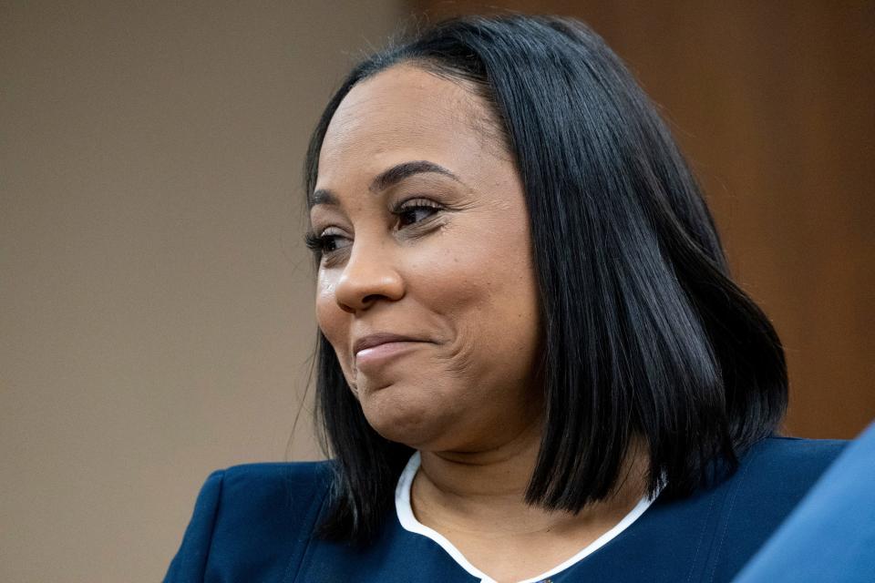 FILE - Fulton County District Attorney Fani Willis watches as potential jurors are excused during proceedings to seat a special purpose grand jury in Fulton County, Georgia, on May 2, 2022, to look into the actions of former President Donald Trump and his supporters who tried to overturn the results of the 2020 election. The hearing took place in Atlanta.