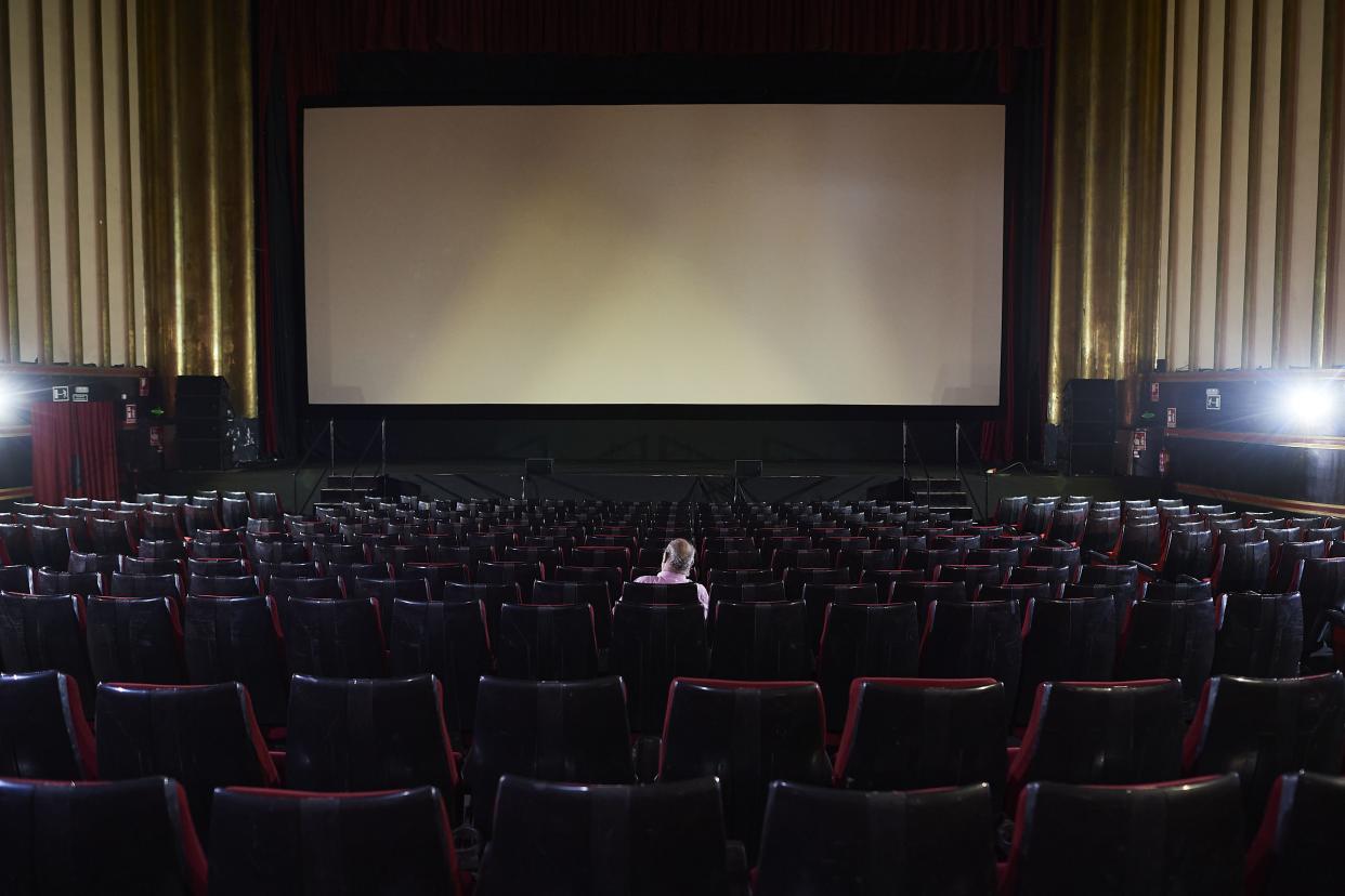 A man waits for the beginning of the film in the Capitol cinema on June 12, 2020 in Madrid, Spain. The Capitol cinema reopened with a 20% capacity in each of its screening rooms after its closure in the middle of March due to the COVID-19 pandemic. This week, all regions are on either Phase One or Two, one month after all of Spain started on Phase Zero on May 4, 2020.