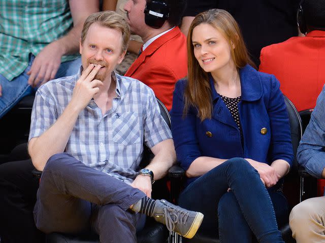 <p>Noel Vasquez/GC Images</p> David Hornsby and Emily Deschanel attend a basketball game between the Oklahoma City Thunder and the Los Angeles Lakers on March 9, 2014.