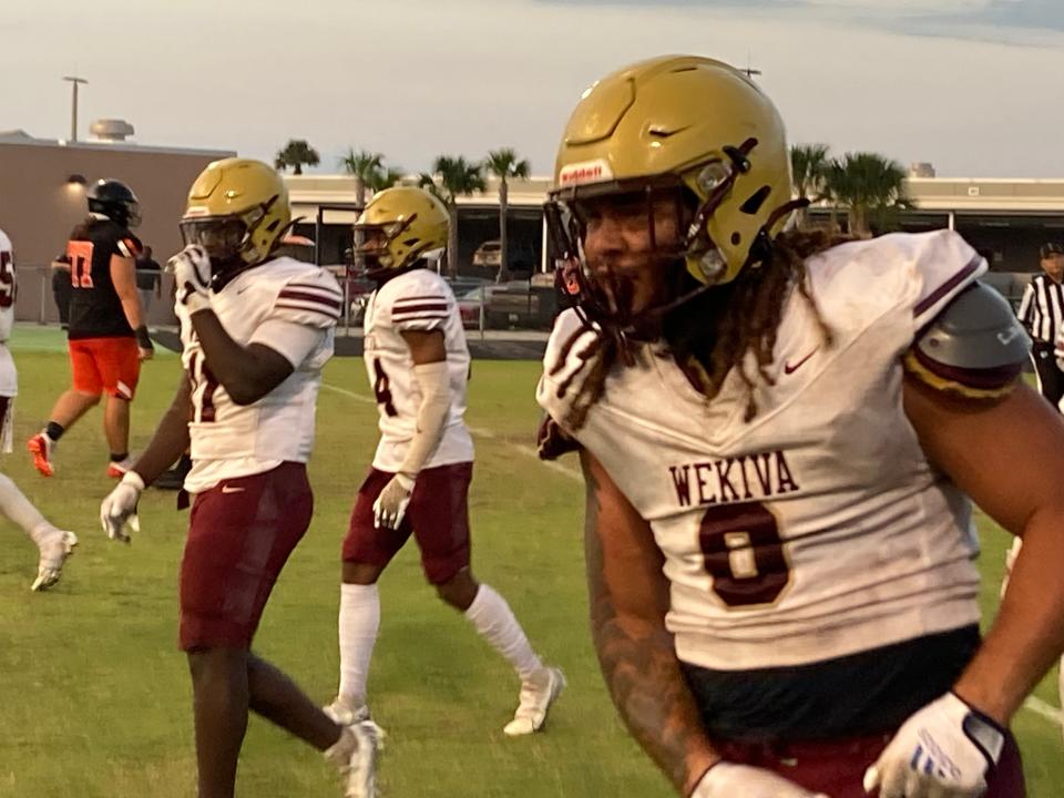 Wekiva's Sincere Edwards celebrates a play in Friday's spring game against Seminole.