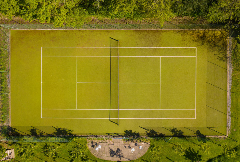 home with tennis court