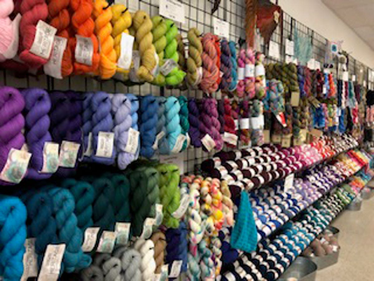 Colorful skeins of yarn are seen at the Bird's Nest in downtown Macomb