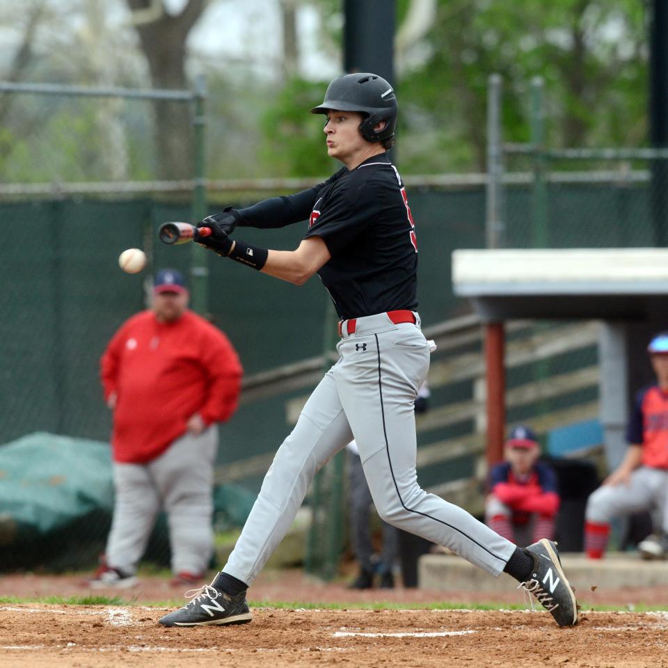 Drew Dollings, of Rosecrans, hits the ball during an 11-5 loss to visiting Fairfield Christian Academy on Thursday during a Mid-State League-Cardinal Division game at Gant Municipal Stadium in Zanesville. The Bishops earned a No. 5 seed at Sunday's Division IV sectional tournament drawing.