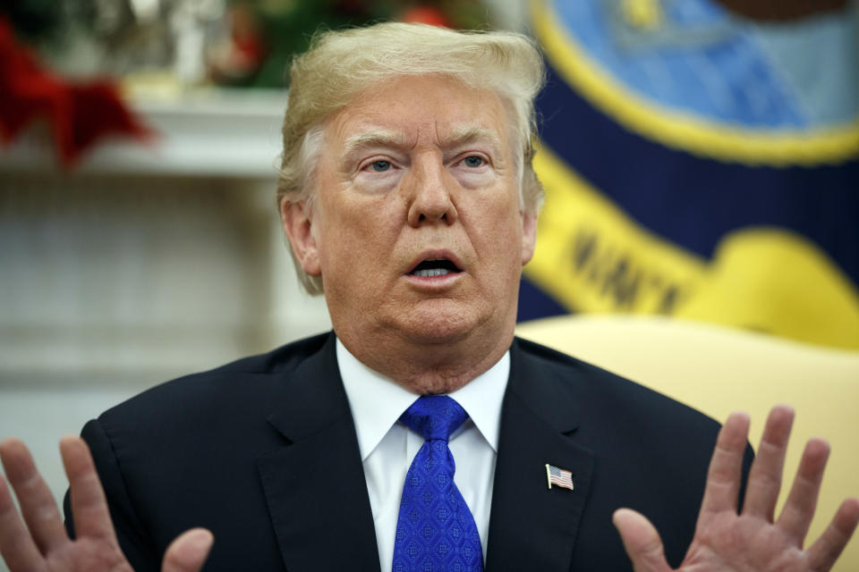 In this Dec. 11, 2018 photo, President Donald Trump speaks during a meets with Democratic leaders the Oval Office in Washington. Against the advice of many in his own administration, Trump is pulling U.S. troops out of Syria. But the abruptness with which Trump is turning the page on Syria is raising questions about whether he might not do the same in Iraq or Afghanistan. (AP Photo/Evan Vucci)