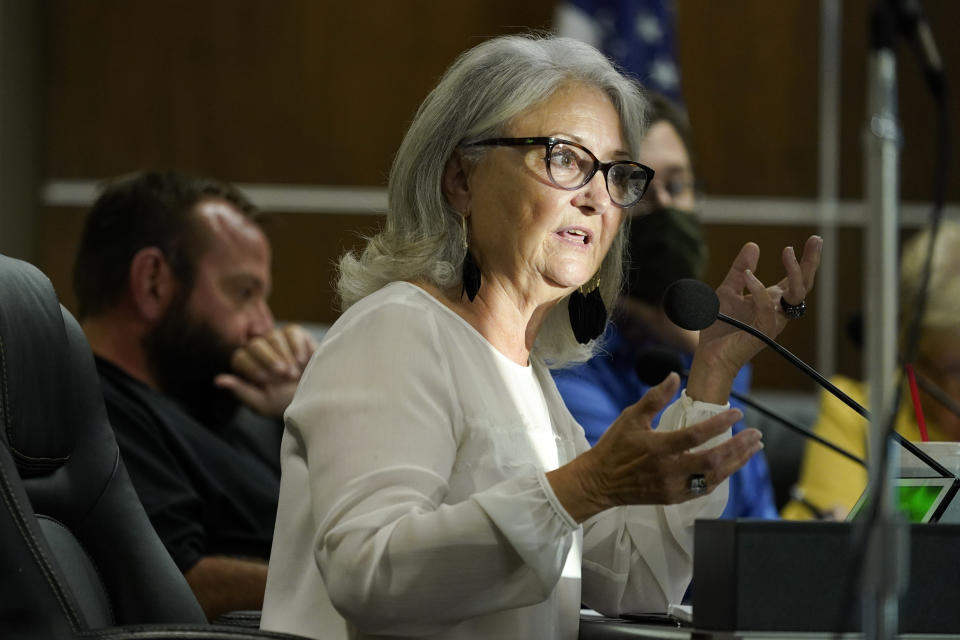 City Council member Margaret Klein speaks during a City Council meeting, Tuesday, Sept. 7, 2021, in Waterloo, Iowa. Joel Fitzgerald, the first Black police chief in Waterloo, is facing intense opposition from some current and former officers as he works with city leaders to reform the department, including the removal of its longtime insignia that resembles a Ku Klux Klan dragon. Klein, who is running for mayor, has called for Fitzgerald's resignation. (AP Photo/Charlie Neibergall)