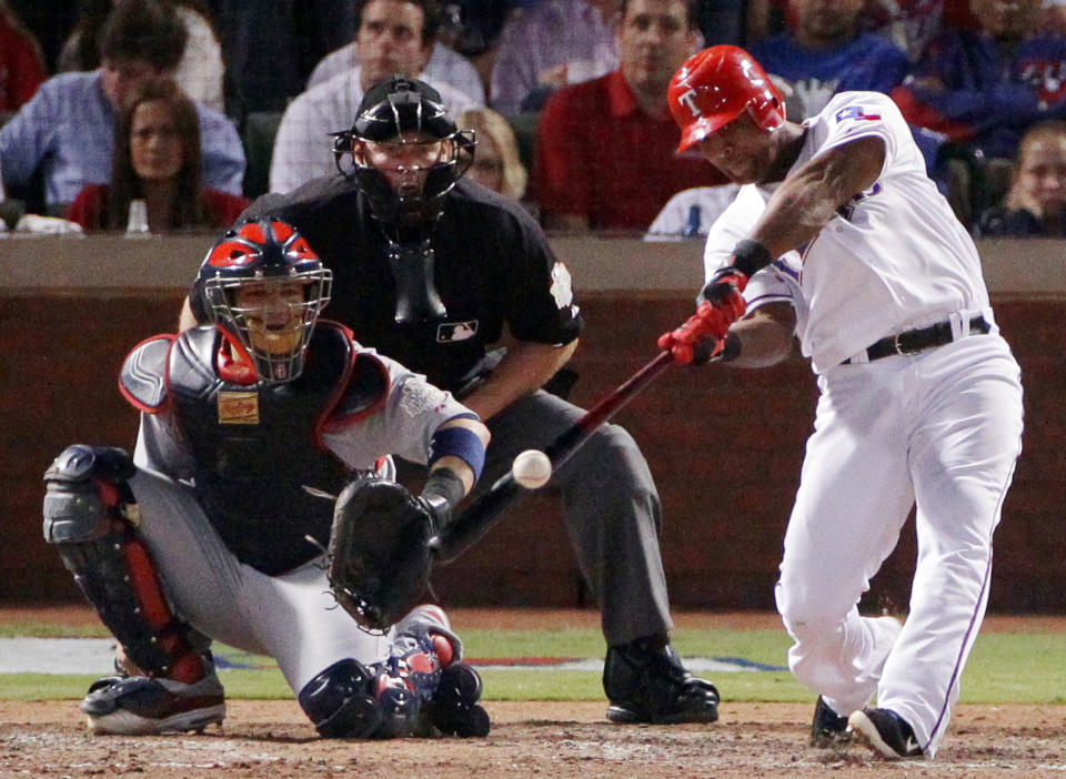 ARLINGTON, TX - OCTOBER 24: Adrian Beltre #29 of the Texas Rangers hits a solo home run in the sixth inning during Game Five of the MLB World Series against the St. Louis Cardinals at Rangers Ballpark in Arlington on October 24, 2011 in Arlington, Texas. (Photo by Doug Pensinger/Getty Images)