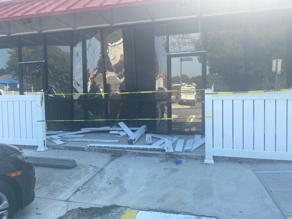 Debris left over after a car crashed into KinderCare.