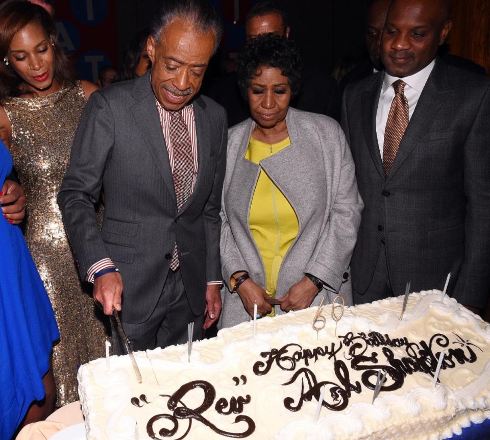 Al Sharpton cuts the cake