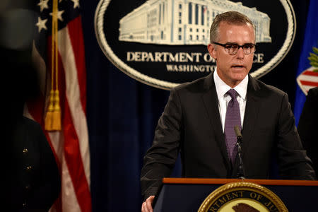 FBI Deputy Director Andrew McCabe details the filing of civil forfeiture complaints seeking the forfeiture and recovery of more than $1 billion in assets associated with an international conspiracy to launder funds misappropriated from a Malaysian sovereign wealth fund 1MDB in Washington July 20, 2016. REUTERS/James Lawler Duggan