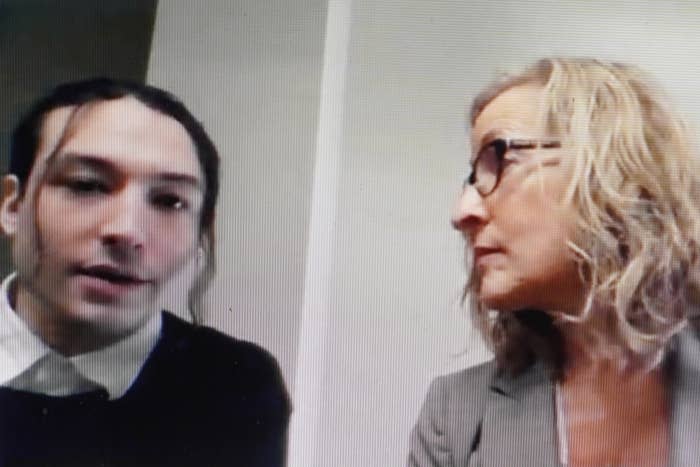 Ezra Miller, left, with their attorney Lisa Shelkrot, appearsin a livestream video remotely from Burlington, Vermont, during Miller's arraignment at Superior Court in Bennington.