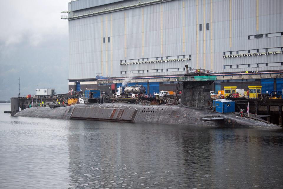 A U.K. Royal Navy Vanguard-class submarine undergoes maintenance at HM Naval Base Clyde at Faslane, north-west of Glasgow, Scotland, April 28, 2023. / Credit: ANDY BUCHANAN/AFP/Getty