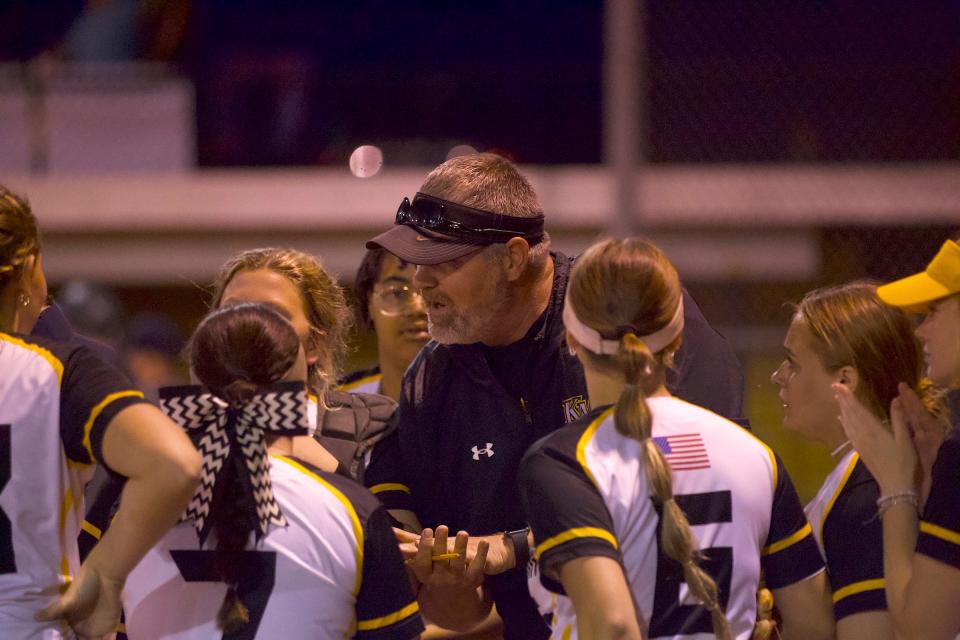 Kings Mountain softball coach Kevin Cruise speaks with his team during their 1-0 win over Crest on April 10, 2024.