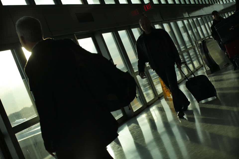 File Photo: Passengers walk in the air train station while they arrive to the Newark Liberty International Airport in Newark, New Jersey. (REUTERS/Eduardo Munoz)