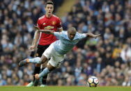 <p>Manchester City’s Fernandinho falls in front of Manchester United’s Ander Herrera </p>