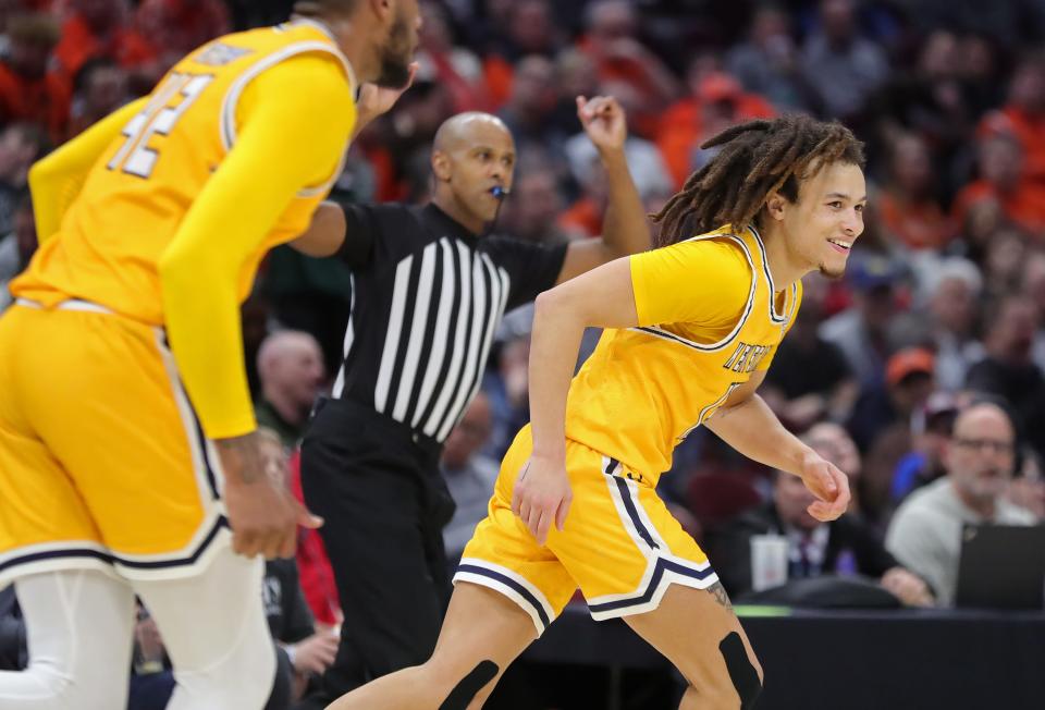 Kent State Golden Flashes guard Jalen Sullinger (13) celebrates after a three during the second half of an NCAA college basketball game in the semifinals of the Mid-American Conference Tournament at Rocket Mortgage FieldHouse, Friday, March 15, 2024, in Cleveland, Ohio.