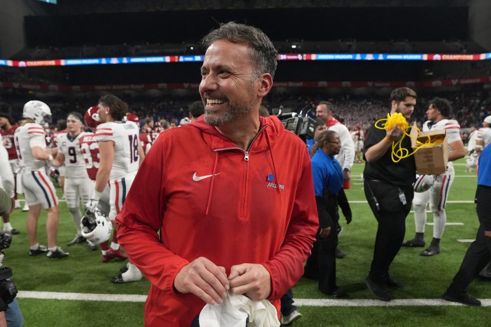 Jedd Fisch celebrates after the Arizona Wildcats defeated the Oklahoma Sooners in the Alamo Bowl on Dec. 28, 2023.