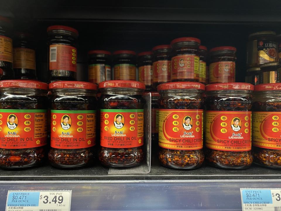 Jars of Lao Ga Ma stocked at a local Chinese supermarket in Queens, New York. / Credit: Daphne K. Lee