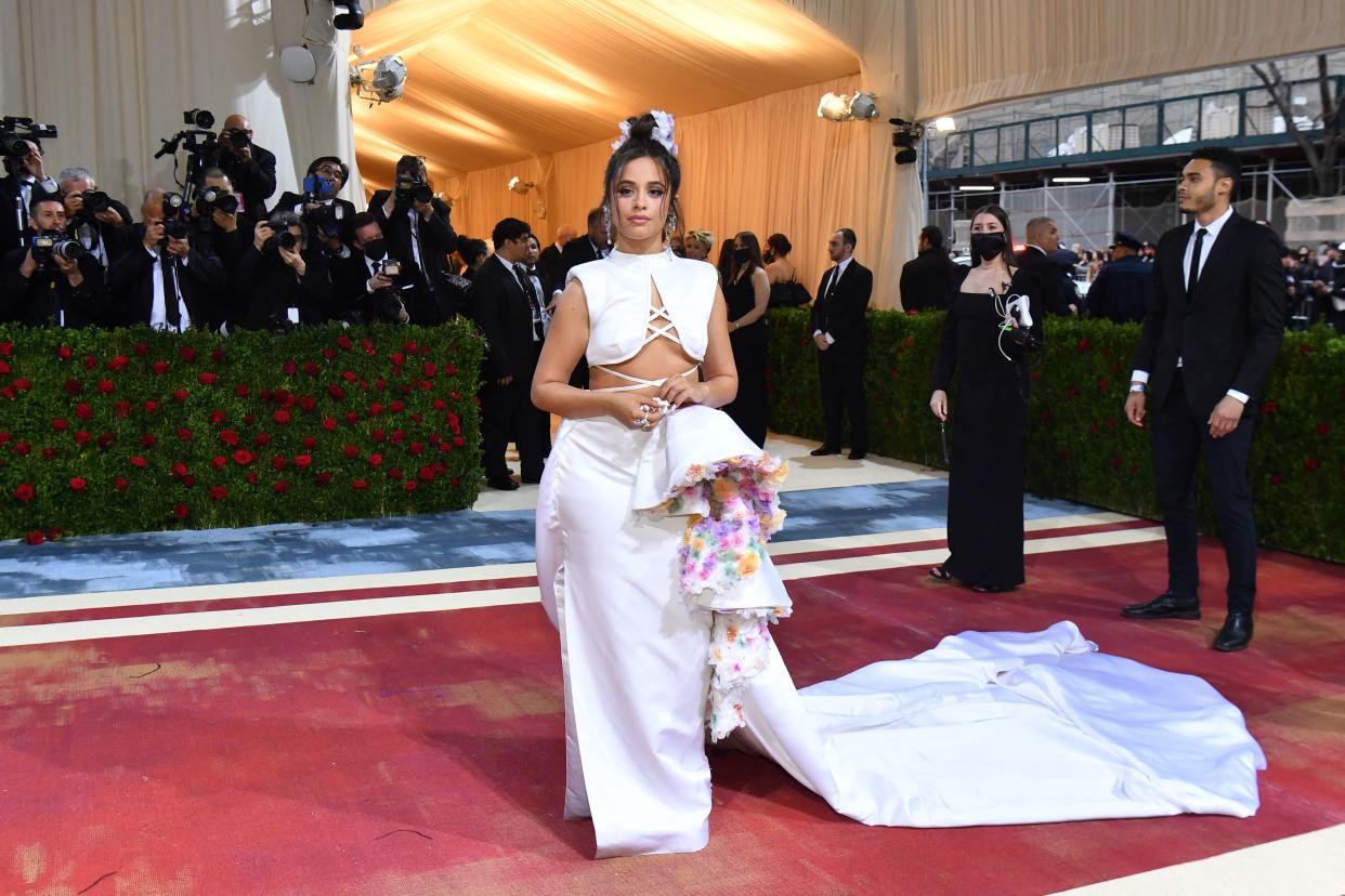 Camila Cabello wore a two-piece white silk gown by Atelier Prabal Gurung to the 2022 Met Gala. (Photo by ANGELA  WEISS/AFP via Getty Images)