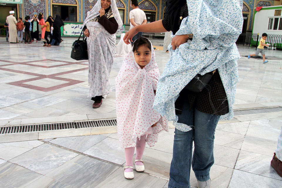<p>A Shiite Muslim girl arrives at Imamzadeh Saleh mosque in Tajrish Square in northern Tehran on May 30, 2017, during the holy fasting month of Ramadan. (Atta Kenare/AFP/Getty Images) </p>