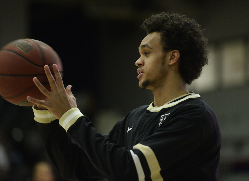 DENVER, CO - FEBRUARY 28: University of Colorado Springs guard Derrick White, during warm-ups before playing Metro State at Metropolitan State University of Denver February 27, 2015. (Photo by Andy Cross/The Denver Post via Getty Images)