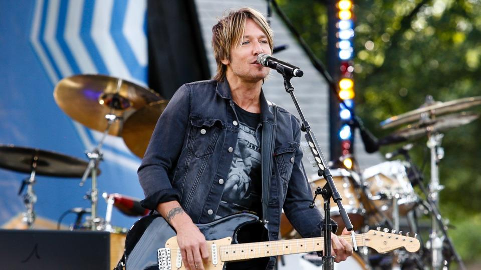 Keith Urban performing on stage