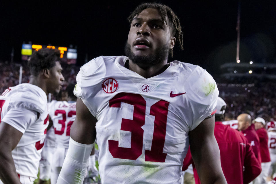 FILE - Alabama linebacker Will Anderson Jr. (31) walks off the field after a 24-22 four-overtime win in an NCAA college football game against Auburn on Saturday, Nov. 27, 2021, in Auburn, Ala. Anderson is a top contender for the 2022 Heisman Trophy and Bronko Nagurski Trophy. (AP Photo/Vasha Hunt, File)